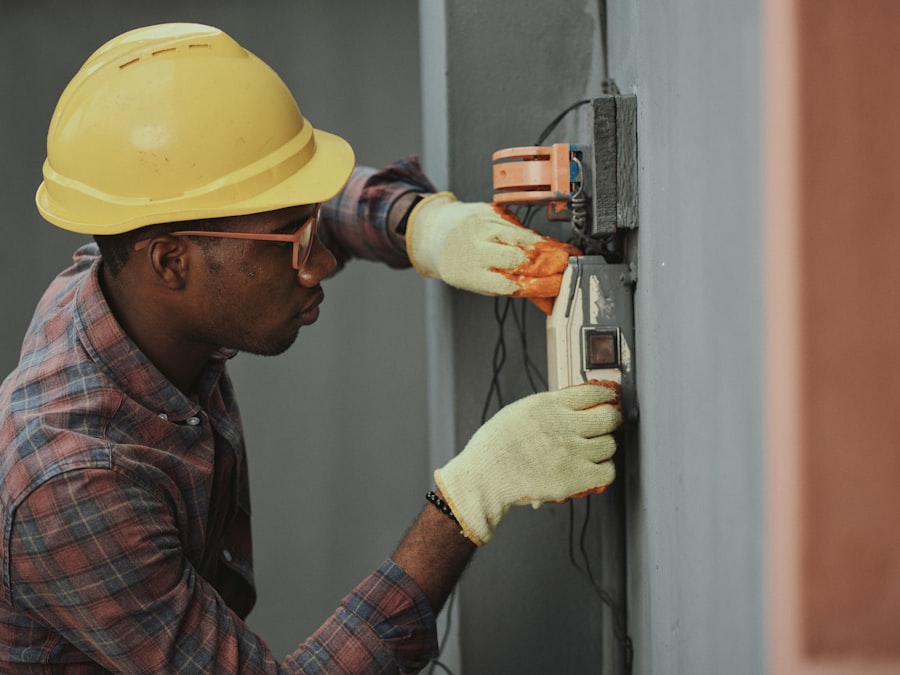 Electrician installing wiring